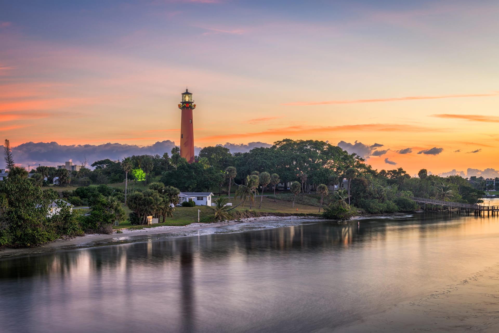 Jupiter Inlet Lighthouse at sunset over the Loxahatchee River in northern Palm Beach County, Florida — Ascend Recovery Center provides drug and alcohol addiction treatment in Palm Beach Gardens, FL