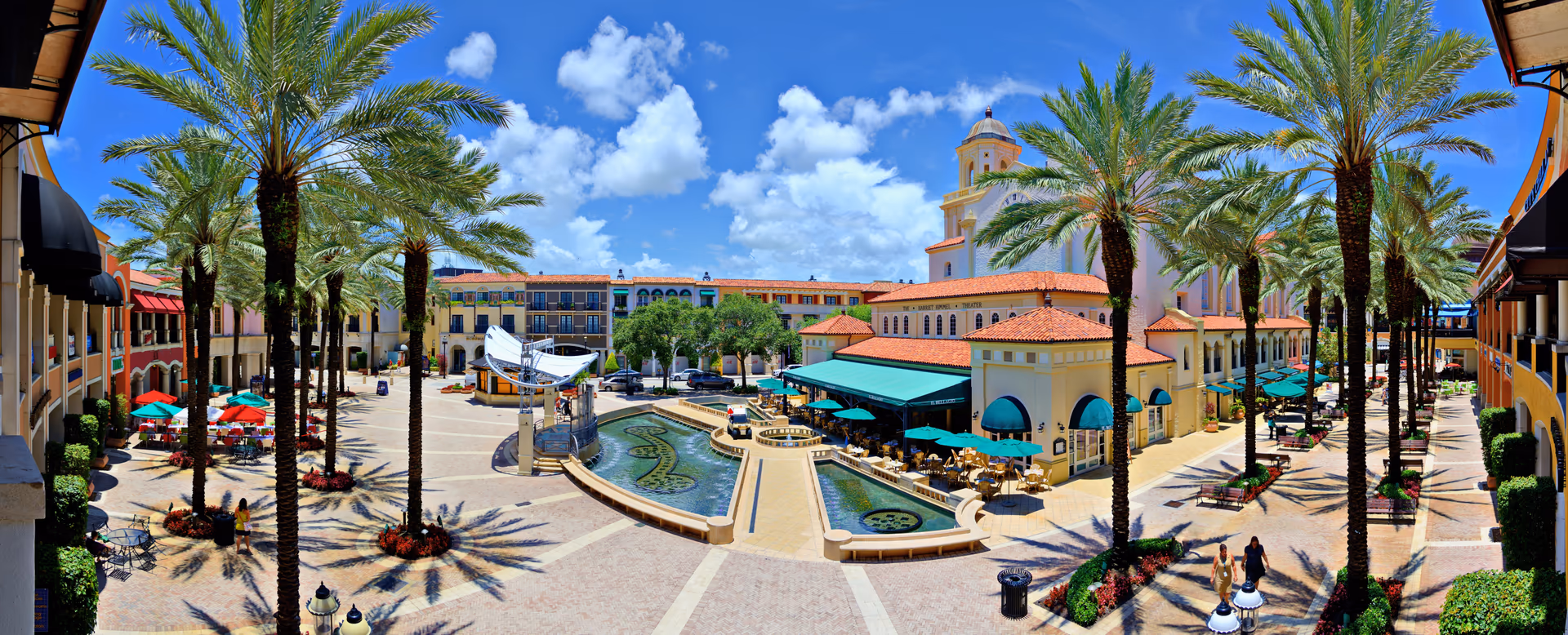 South Florida downtown plaza with palm-lined Mediterranean revival architecture, representative of the Delray Beach service area